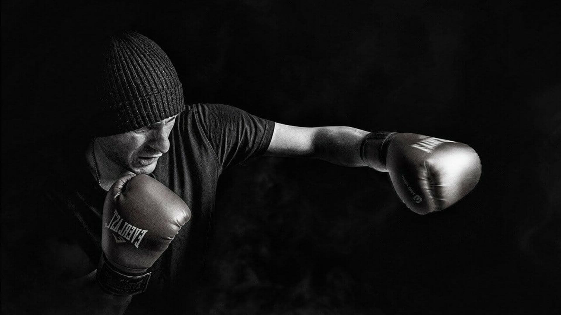Black And White Image Of Boxer Practicing