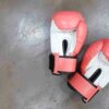 Pink Boxing Gloves On Polished Concrete 1