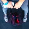 Looking Down At Gym Bag And Shoes 1