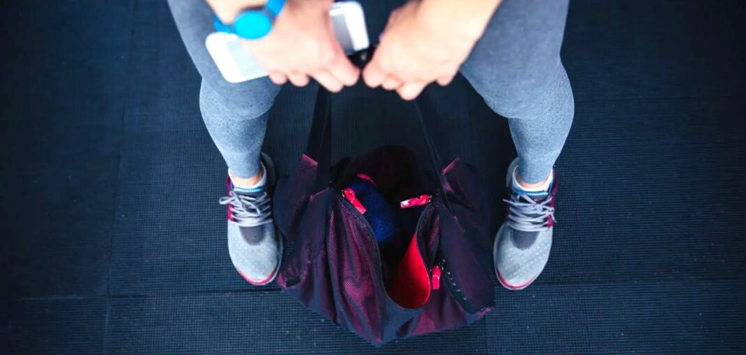 Looking Down At Gym Bag And Shoes 1